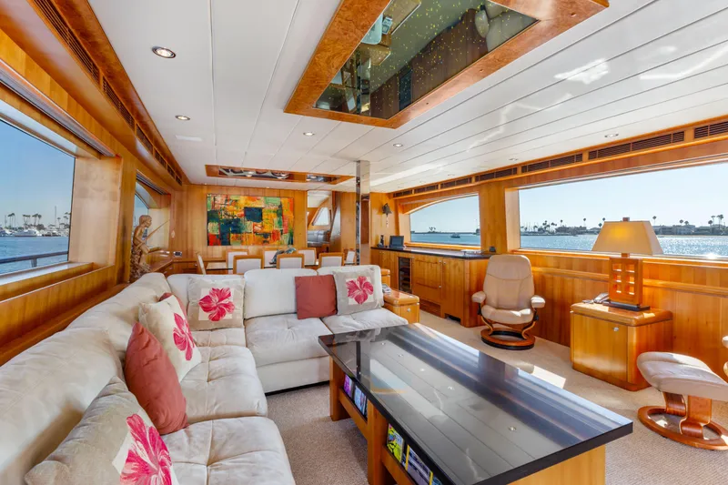 Slide: The Image of Luxurious yacht interior with plush seating, large windows, and elegant wood finishes, 2005 Custom model. - 38