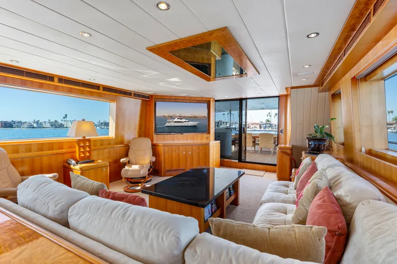 Slide: The Image of Luxurious yacht interior with modern dining area, vibrant artwork, and ocean view, 2005 Custom model. - 40