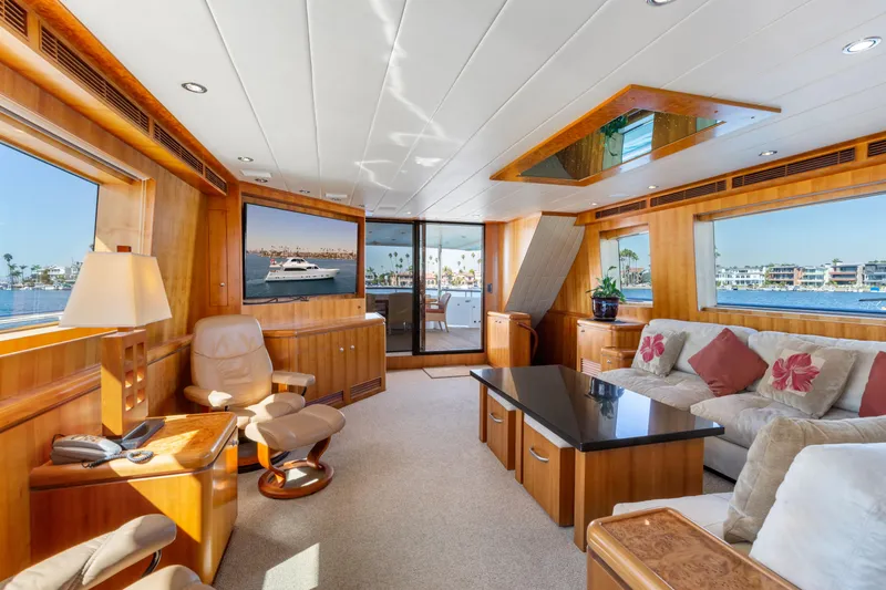 Slide: The Image of Luxurious yacht interior with modern dining area, large windows, and vibrant artwork, 2005 Custom model. - 41