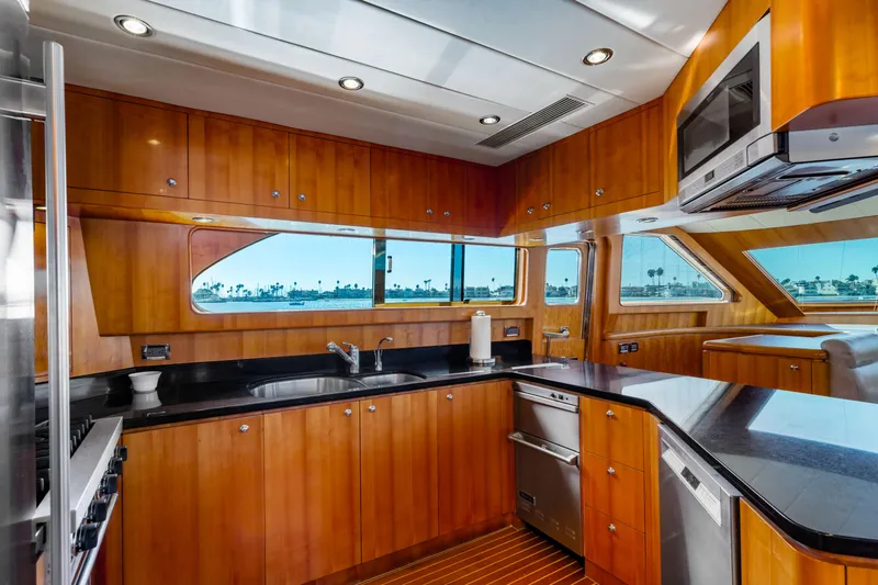 Slide: The Image of Luxurious yacht interior with leather seating, wooden accents, and panoramic windows, 2005 Custom model. - 48