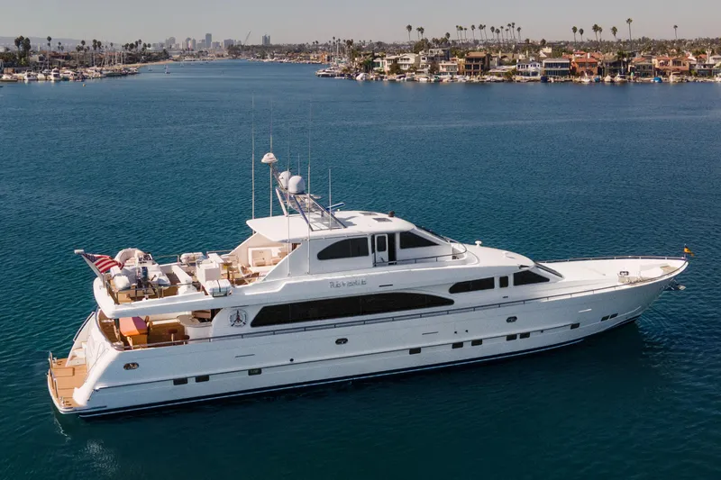 Slide: The Image of Luxury yacht "Reverie" cruising near coastal homes, 2005 C Custom model. - 5