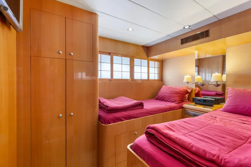 Slide: The Image of Cozy yacht bedroom with red pillows, wooden walls, and modern lighting, 2005 Custom model. - 68