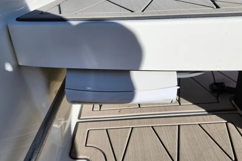 Slide: The Image of 2020 Boston Whaler 110 Sport boat detail with shadow on deck. - 11