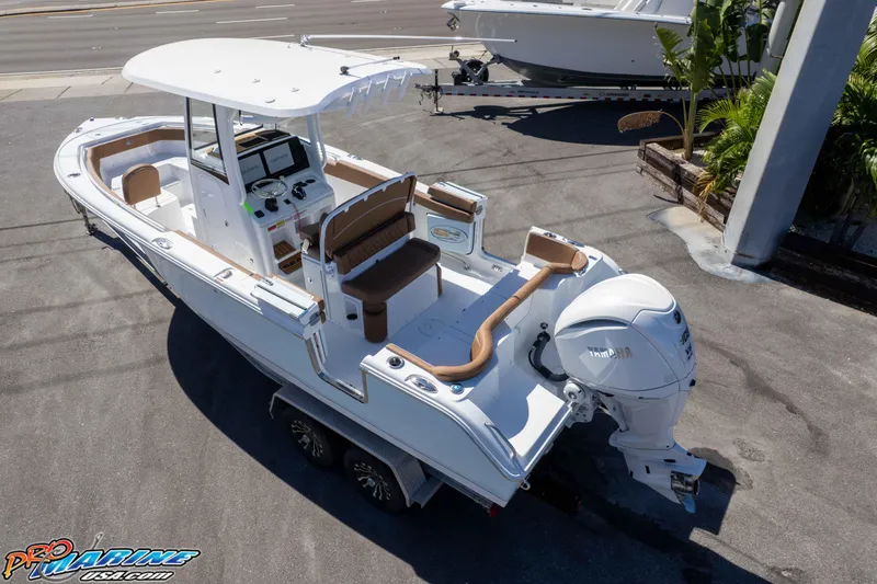 Slide: The Image of 2026 Sea Hunt Ultra 255 SE boat with Yamaha engine on trailer, aerial view. - 9