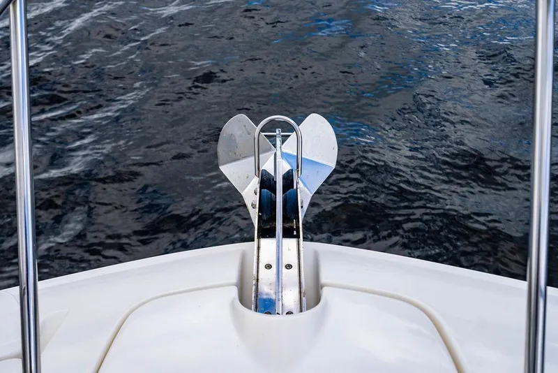 Slide: The Image of Bow anchor of 2021 Sea Ray Sundancer 320 Outboard on water. - 20