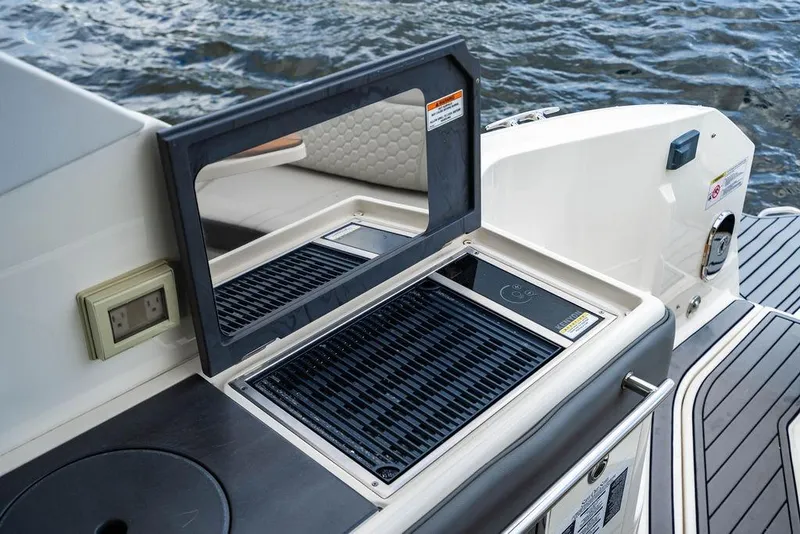 Slide: The Image of Outdoor grill on 2021 Sea Ray Sundancer 320 Outboard yacht, near water. - 47