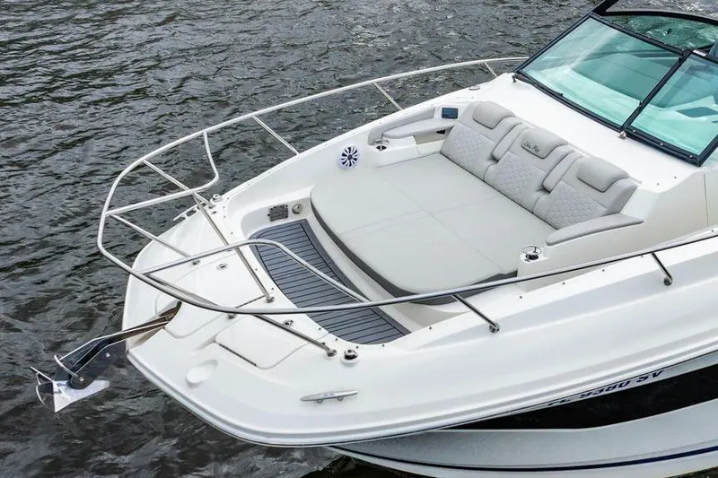 Slide: The Image of 2021 Sea Ray Sundancer 320 Outboard boat with spacious deck and seating on water. - 5