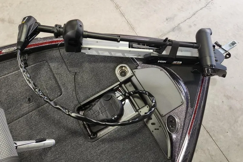 Slide: The Image of Triton 179 TrX 2026 boat with Minn Kota trolling motor on deck. - 9