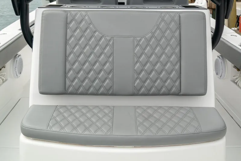 Slide: The Image of Gray diamond-stitched seating on 2026 Front Runner 33' Center Console boat. - 21