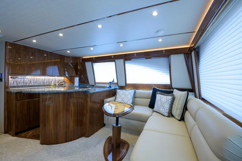 Slide: The Image of Luxurious interior of 2017 Viking 48 Convertible yacht with elegant seating and modern kitchen. - 2