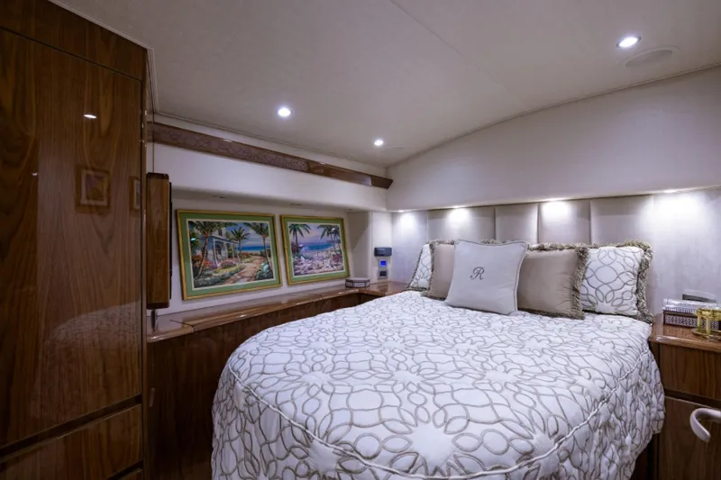 Slide: The Image of Luxurious bedroom interior of 2017 Viking 48 Convertible yacht with elegant bedding and artwork. - 3