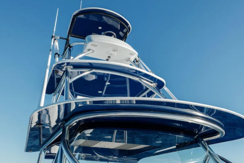 Slide: The Image of 2026 Front Runner 47' Center Console boat with sleek design against clear blue sky. - 20