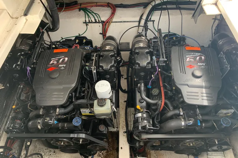 Slide: The Image of Engine compartment of a 2002 Cruisers 3275 Express with twin MerCruiser 5.0 MPI engines. - 6