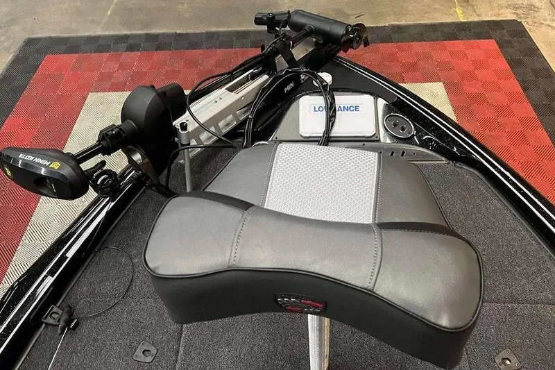 Slide: The Image of 2025 Triton 18 TrX boat with Minn Kota trolling motor and Lowrance electronics. - 6