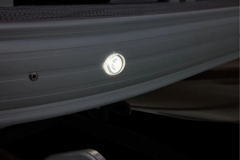 Slide: The Image of Manufacturer Provided Image: 2026 Sun Tracker Party Barge 18 DLX pontoon boat with illuminated side light. - 29