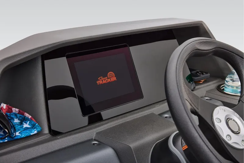 Slide: The Image of Manufacturer Provided Image: Dashboard of 2026 Sun Tracker Party Barge 18 DLX with steering wheel and display. - 47
