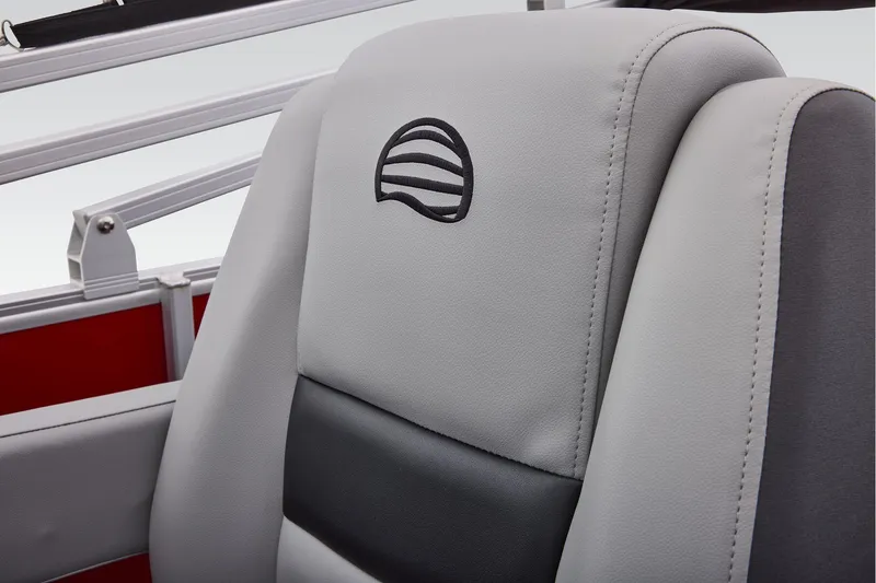 Slide: The Image of Manufacturer Provided Image: 2026 Sun Tracker Party Barge 18 DLX seat with logo, featuring gray and black upholstery. - 49