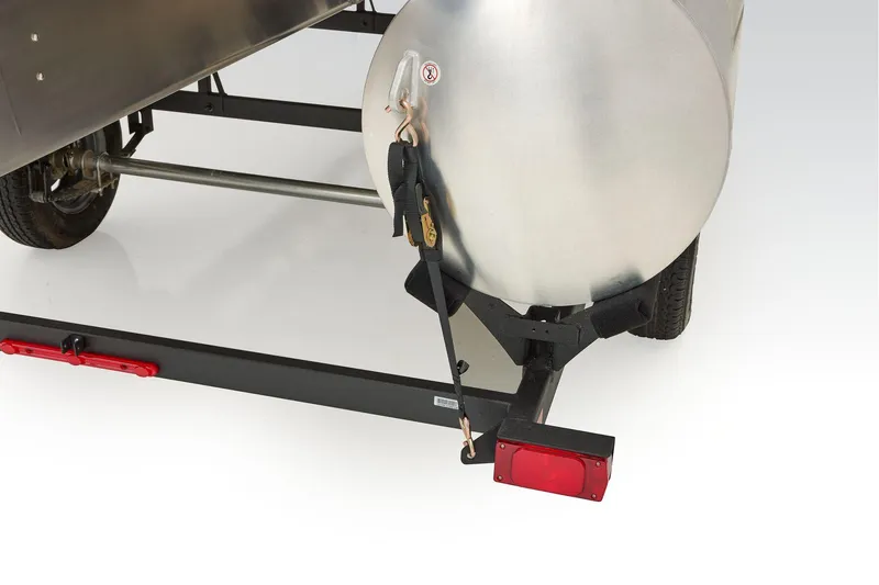 Slide: The Image of Manufacturer Provided Image: 2026 Sun Tracker Party Barge 18 DLX trailer detail with secure strap and rear light. - 62