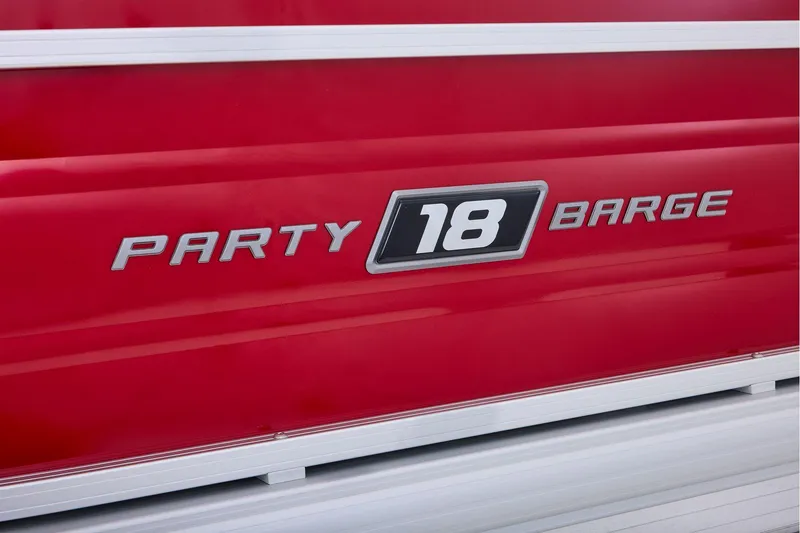 Slide: The Image of Manufacturer Provided Image: 2026 Sun Tracker Party Barge 18 DLX, red exterior detail. - 66