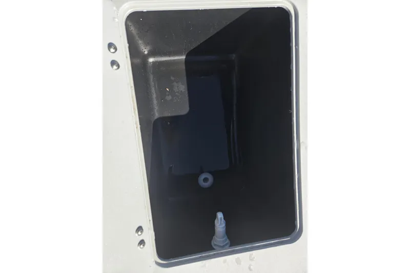 Slide: The Image of Open storage compartment in 2020 Avalon Venture Fish N Cruise boat. - 10