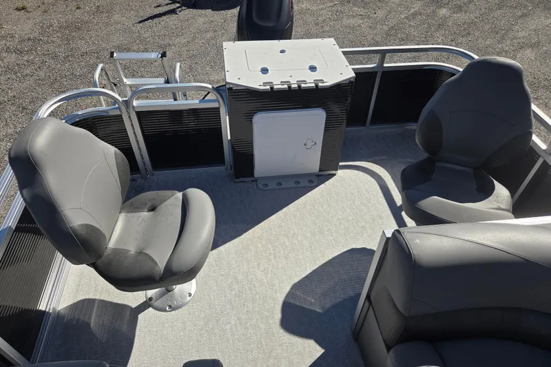 Slide: The Image of 2020 Avalon Venture Fish N Cruise boat interior with seating and storage. - 11