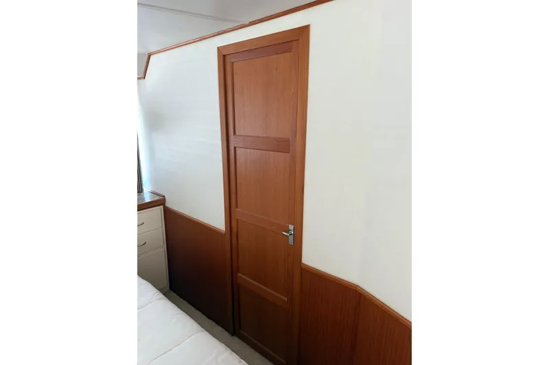 Slide: The Image of Wooden interior door on 1996 Harbor Master 52 Wide Body boat. - 28