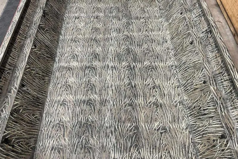 Slide: The Image of Camouflage interior of 2026 Tracker Grizzly 2072 Utility boat, featuring grass-like pattern. - 4