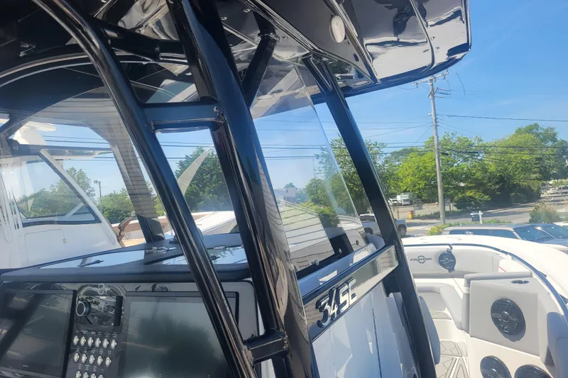 Slide: The Image of 2025 Fountain 34 SC boat interior with sleek design and advanced navigation system. - 17