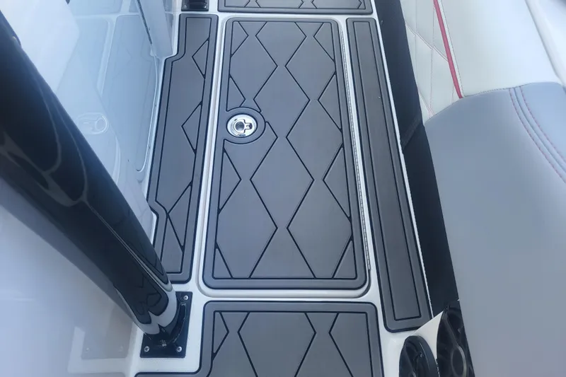 Slide: The Image of 2025 Fountain 34 SC boat deck with sleek, modern design and geometric patterns. - 18