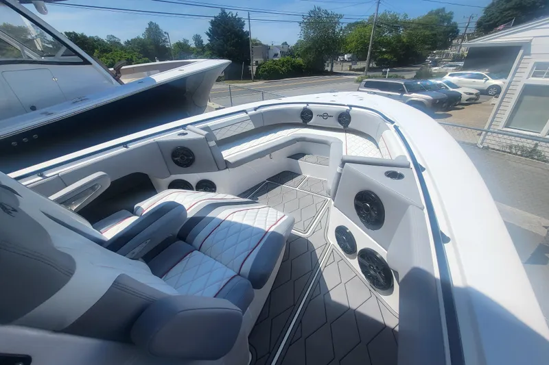 Slide: The Image of 2025 Fountain 34 SC boat interior with luxurious seating and modern design. - 20