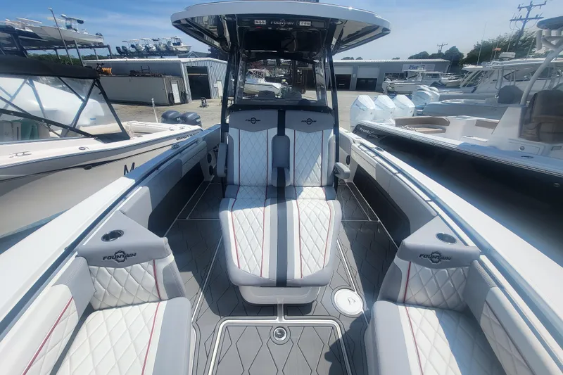 Slide: The Image of 2025 Fountain 34 SC boat interior with luxurious seating and modern design. - 22