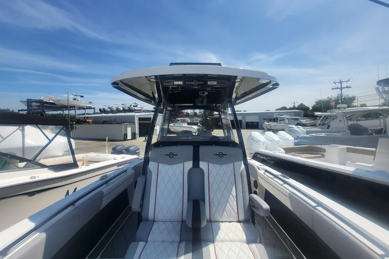 Slide: The Image of 2025 Fountain 34 SC boat interior with modern seating and sleek design. - 26