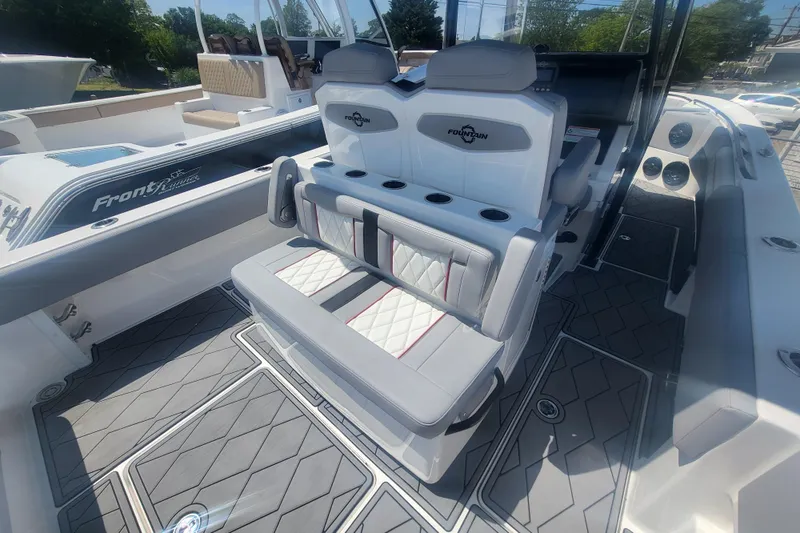 Slide: The Image of 2025 Fountain 34 SC boat interior with luxurious seating and modern design. - 32