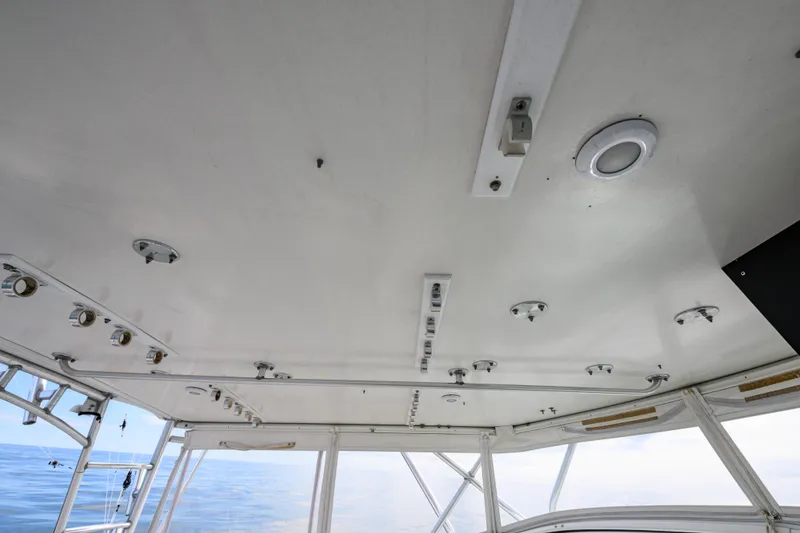 Slide: The Image of Ceiling view of 1998 Bertram 36 Moppie boat with installed lighting fixtures. - 13