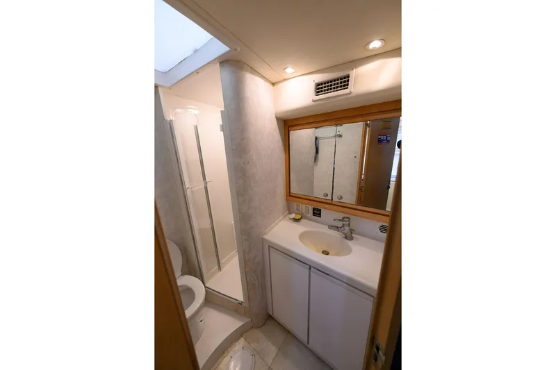 Slide: The Image of Bathroom interior of 1998 Bertram 36 Moppie yacht with shower and vanity. - 26