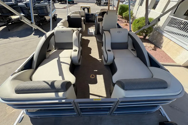 Slide: The Image of 2017 Veranda Relax V2275RFL pontoon boat interior with plush seating and modern design. - 12