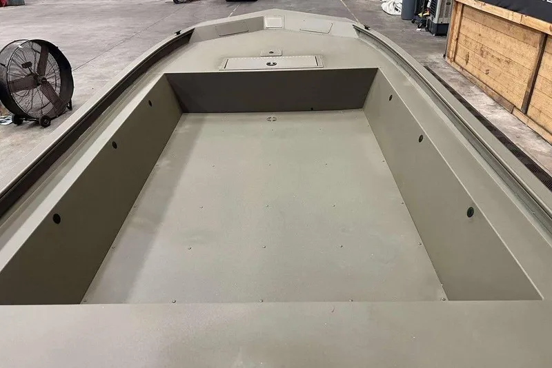 Slide: The Image of 2026 Tracker Grizzly 1754 Utility boat interior, spacious and durable design. - 7