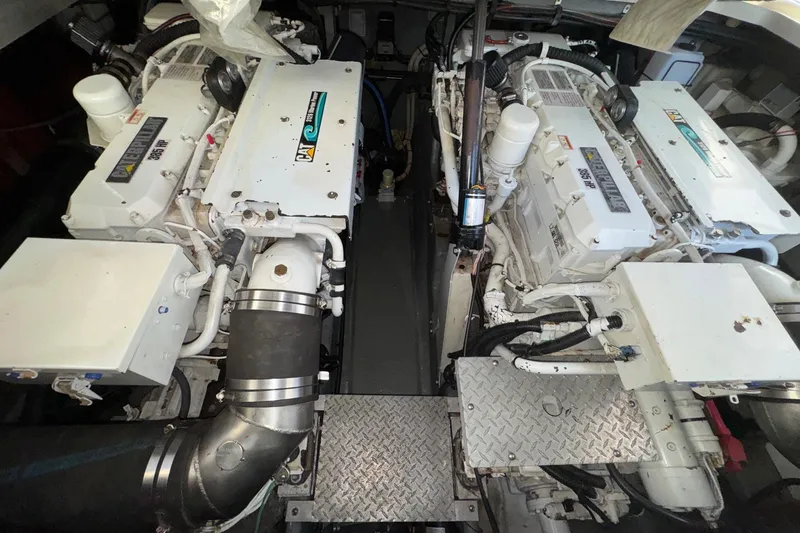 Slide: The Image of Engine room of a 2001 Sea Ray 410 Sundancer with twin Caterpillar engines. - 26