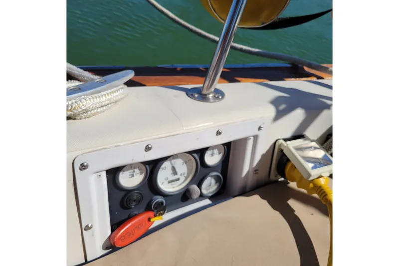 Slide: The Image of Control panel of a 1984 Pearson 386 sailboat with gauges and electrical connections. - 20