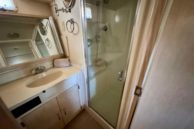 Slide: The Image of Bathroom interior of 1993 Tollycraft 57 Pilothouse Motor Yacht with sink and shower. - 29