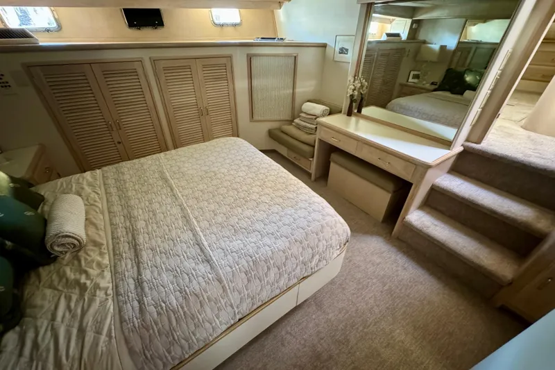 Slide: The Image of Bathroom interior of 1993 Tollycraft 57 Pilothouse Motor Yacht, featuring sink and toilet. - 31