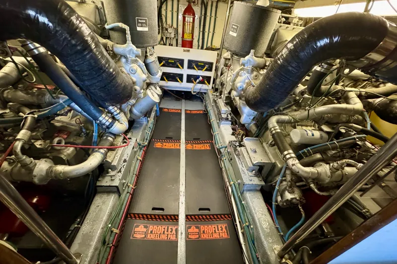 Slide: The Image of Laundry area with stacked washer and dryer in 1993 Tollycraft 57 Pilothouse Motor Yacht. - 43