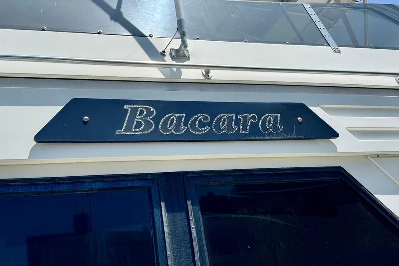 Slide: The Image of 1993 Tollycraft 57 Pilothouse Motor Yacht with "Bacara" nameplate. - 49