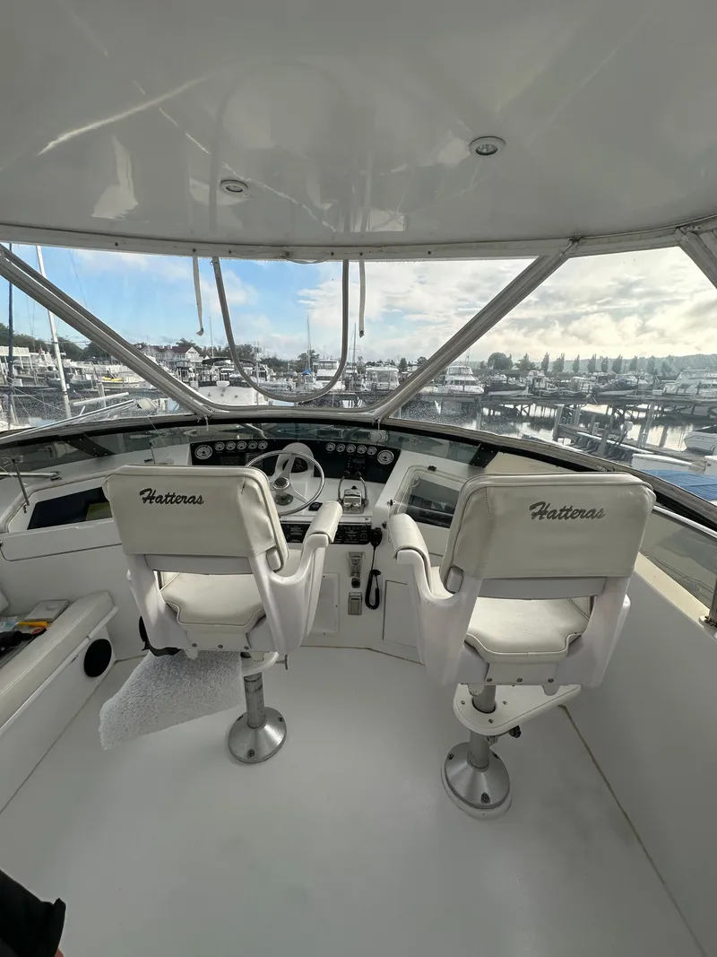 Slide: The Image of Cockpit view of 1994 Hatteras 48 Cockpit MY yacht with dual helm seats. - 5