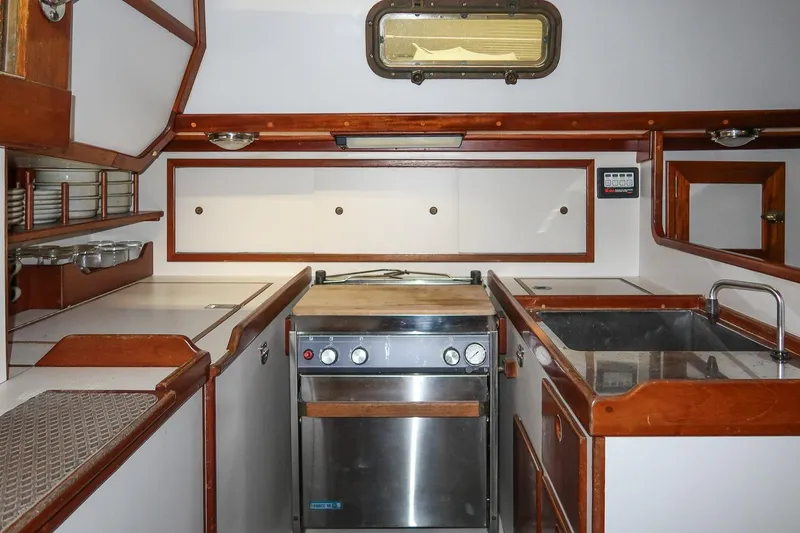Slide: The Image of Interior of 1989 Morris Ocean Series 32 yacht kitchen with stove and sink. - 19