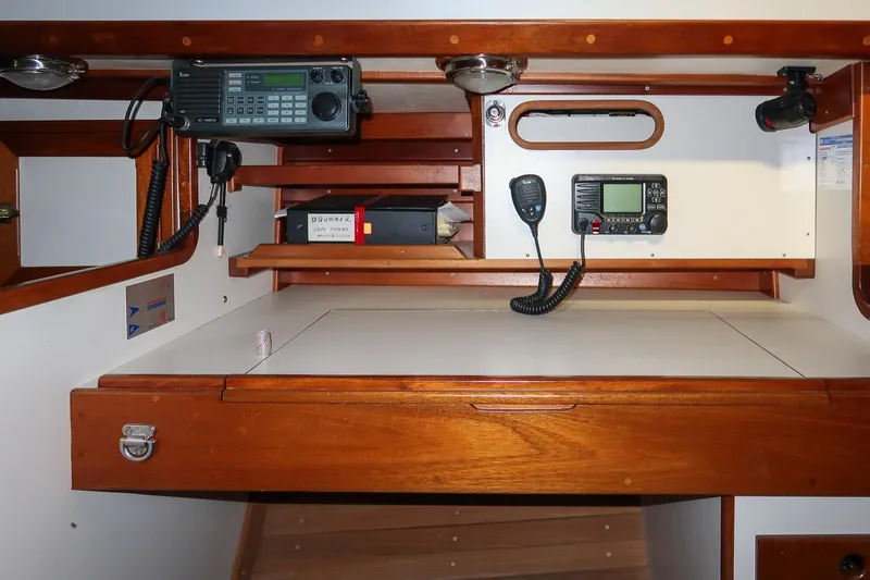 Slide: The Image of Navigation station of 1989 Morris Ocean Series 32 yacht with communication equipment. - 23