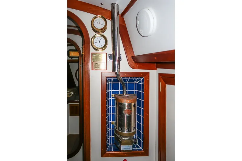 Slide: The Image of Interior of 1989 Morris Ocean Series 32 yacht with nautical instruments and wood paneling. - 26