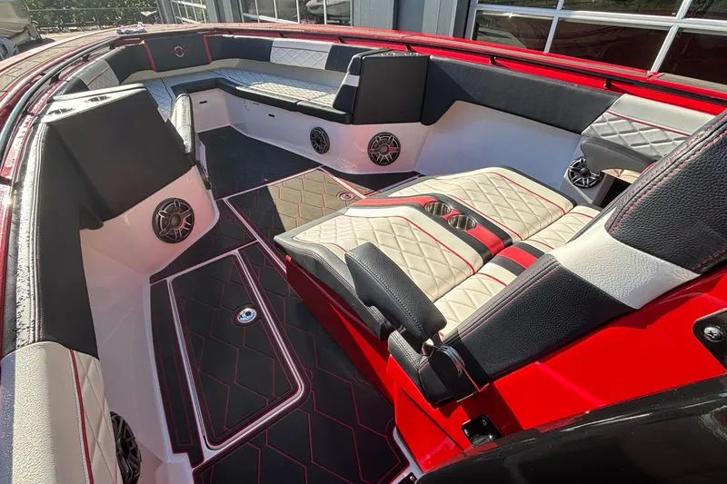 Slide: The Image of Luxurious interior of 2021 Fountain 38 SC boat with red and black accents. - 13