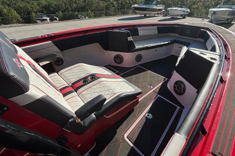 Slide: The Image of Luxurious interior of a 2021 Fountain 38 SC boat with red and white seating. - 14