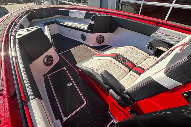 Slide: The Image of Luxurious interior of 2021 Fountain 38 SC boat with red and black seating. - 17